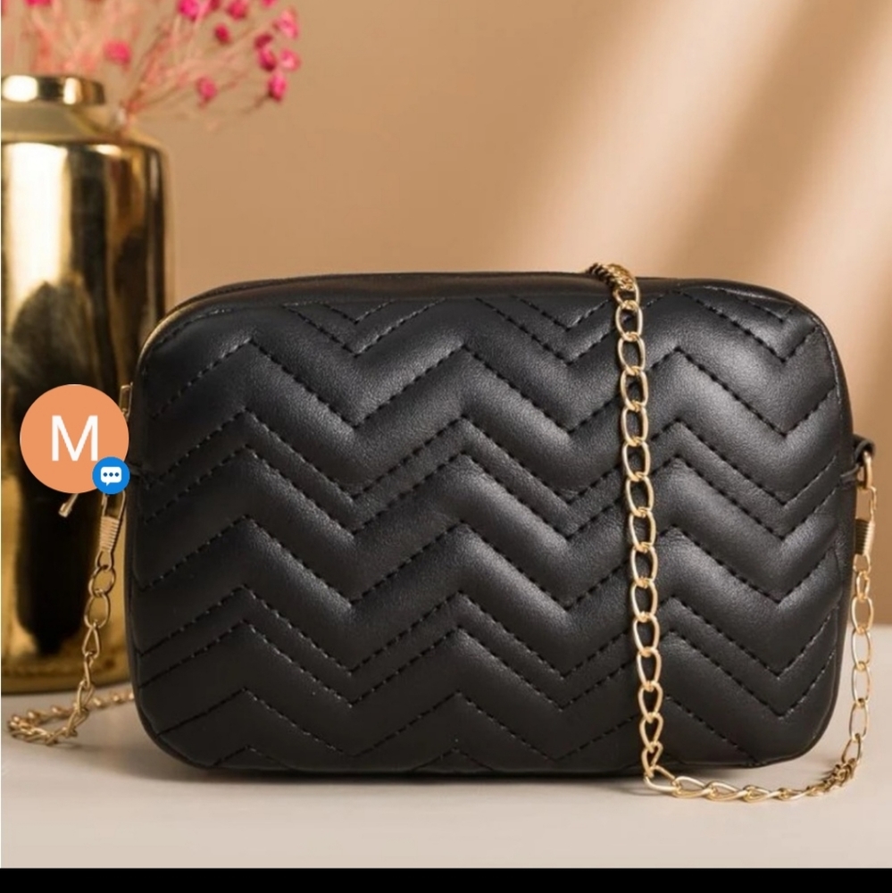 This is Tara Diamond mini bag size 4.3×6.7 inch black color